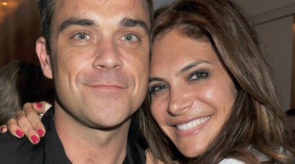 Robbie Williams försöker bli pappa